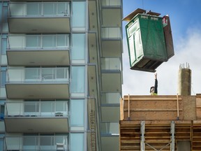 Buildings are under construction around Cambie and SW Marine drive in Vancouver, B.C., October 10, 2017.