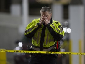 FILE PHOTO Vancouver police investigate a police-involved shooting inside the parking lot of the Canadian Tire store on Grandview Highway near Rupert in East Vancouver on November 10, 2016.