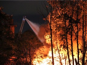 Massive fire at an auto wrecker yard at 13600 block of Mitchell Road on Mitchell Island at 8 p.m. Thursday, October 12, 2017.