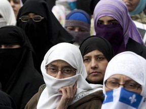 In 2010, women protest a proposed face-covering ban, saying the legislation reflects cultural xenophobia and has no place in Quebec society.