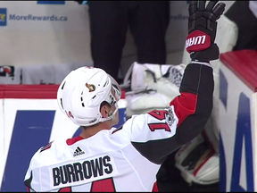 Alex Burrows waves to fans during the Senators' game against the Canucks at Rogers Arena in Vancouver.