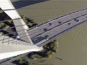 VANCOUVER, B.C.: UNDATED – These are screengrabs from a Rotor Riot video of a drone completing a bridge dive off the Alex Fraser Bridge in Delta, B.C. The video was initially posted to YouTube but had also made its way over to Chinese video site Youku. [PNG Merlin Archive] ROTOR RIOT / YOUKU SCREENGRAB, PNG