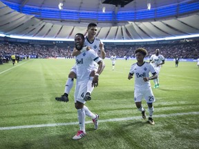 Fredy Montero, given a ride by teammate Kendall Waston during Wednesday's 5-0 playoff victory against the San Jose Earthquakes, can't wait to face the Seattle Sounders on Sunday at B.C. Place Stadium.