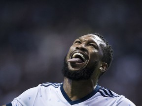 Whitecaps' Kendall Waston celebrates his goal against the San Jose Earthquakes during the second half of an MLS playoff game in Vancouver on Oct. 25.