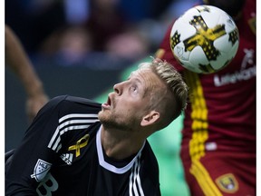Vancouver Whitecaps' goalkeeper David Ousted says his team has to keep its eye on the ball, and first place, when it faces the New York Red Bulls on Saturday. The Caps will be missing a few star players when they head to the Big Apple.