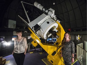 Ondrea Clarkson,left, and Clare Higgs at the UVic Observatory on the top of the Bob Wright Building in Victoria, B.C. October 20, 2017.