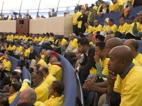 Taxi drivers protest Uber at a Toronto city council meeting in 2015. In B.C., that opposition played out in the May election, and explains the reluctance of the NDP — and secretly the Liberals — to move quickly on ride-hailing services.