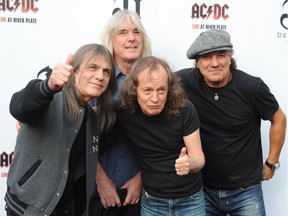 Malcolm Young, Cliff Williams, Angus Young and Brian Johnson of AC/DC Premiere of 'AC/DC - Live at River Plate' at Hammersmith Apollo - Arrivals London, England. Malcolm Young, 64, has died.