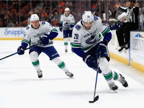 Brandon Sutter of the Vancouver Canucks skates with the puck during the second period of a game against the Anaheim Ducks  at Honda Center on Nov. 9, 2017 in Anaheim, California.