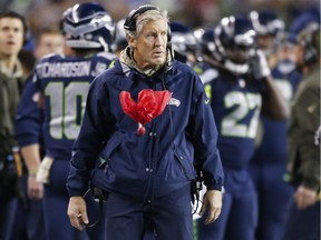 Seattle Seahawks head coach Pete Carroll stands on the sideline during an NFL football game against the Atlanta Falcons in Seattle. Carroll and the Seahawks have a lot bigger worries than wondering if the San Francisco 49ers are ready to make a quarterback switch to Jimmy Garoppolo.