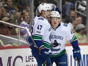 Brock Boeser celebrates after scoring his first of two goals Wednesday.