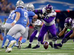 The Minnesota Vikings recover a fumble by quarterback Matthew Stafford #9 of the Detroit Lions during the first half at Ford Field on November 23, 2017 in Detroit, Michigan.