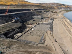 Aerial view of the south bank excavation of Site C project, including the stilling basin and powerhouse buttress.