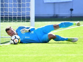 New Zealand's goalkeeper Stefan Narinovic makes a save during the World Cup football qualifying match between New Zealand and Peru at Westpac Stadium in Wellington on Saturday.