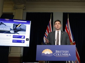 Attorney General David Eby speaks to media following the public engagement launch for a provincial referendum on electoral reform.