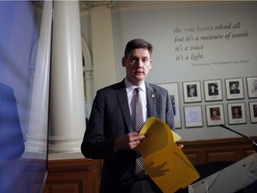 Attorney General David Eby arrives to speak to the media after the public-engagement launch for next year's provincial referendum on electoral reform during a news conference at the legislature in Victoria on Nov. 23, 2017.