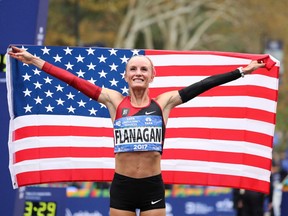 Shalane Flanagan celebrates her victory in the New York City marathon on Nov. 5.