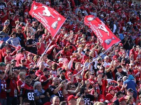 Calgary Stampeders fans cheer their team after they beat the Edmonton Oilers 39-18 in the Labour Day Classic at McMahon Stadium, Monday September 4, 2017. Gavin Young/Postmedia Postmedia Calgary Gavin Young, Calgary Herald