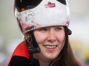Canada's Jane Channell, of North Vancouver, B.C., smiles after racing to a second-place finish during a World Cup Skeleton race in Whistler, B.C., on Friday November 24,