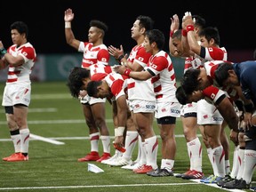 Japan's rugby team applaud supporters at the end of their rugby union international match against France at the U Arena, in Nanterre, west of Paris, Saturday, Nov. 25, 2017.