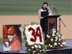 Brandy Halladay, wife of the late pitcher Roy Halladay, wipes her eyes while talking about her husband during an event honouring his life at Spectrum Field in Clearwater, Fla., on Tuesday, Nov. 14, 2017. Halladay, a two-time Cy Young Award winner, died Nov. 7 at age 40 when the private plane he was piloting crashed into the Gulf of Mexico off the coast of Florida.