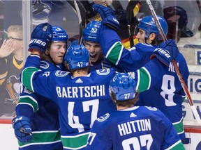 A 4-2 win over the defending Stanley Cup champion PIttsburgh Penguins on Saturday was the latest in surprises for the Vancouver Canucks as head coach Travis Green has the club overachieving early in the season.