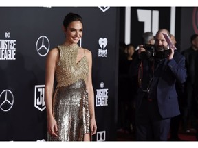 Gal Gadot, a cast member in "Justice League," poses at the premiere of the film at the Dolby Theatre on Monday, Nov. 13, 2017, in Los Angeles. (Photo by Chris Pizzello/Invision/AP)