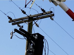 A worker was taken to hospital after making contact with power lines like these in Surrey on Wednesday.