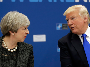 British Prime Minister Theresa May and U.S. President Donald Trump at a NATO meeting in Brussels, May 25, 2017.