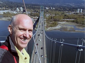 Kevin Thomson atop the Lions Gate Bridge.