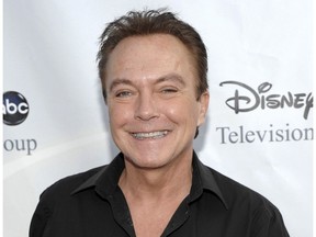 This Aug. 8, 2009 file photo shows actor-singer David Cassidy arrives at the ABC Disney Summer press tour party in Pasadena, Calif. Cassidy has been hospitalized in Florida. His representative tells The Associated Press on Saturday, Nov. 18, 2017, that Cassidy is "now conscious" and "surrounded by family." The rep adds that Cassidy was in pain and taken to the hospital on Wednesday. No additional details were provided. (AP Photo/Dan Steinberg, File)
