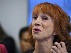 FILE - In this June 2, 2017, file photo, comedian Kathy Griffin speaks during a news conference in Los Angeles, to discuss the backlash since Griffin released a photo and video of her displaying a likeness of President Donald Trump's severed head. Griffin said in a YouTube video posted Nov. 18, 2017, that she has been on a "Hollywood blacklist" since the photo was released. (AP Photo/Mark J. Terrill, File)
