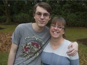 Kelly Ennis, along with other residents of the Surrey trailer park where she lives with her three boys, is adopting a family through the Surrey Christmas Bureau. Years ago, Ennis was forced to turn to the bureau herself. Now she is giving back. Ennis is pictured Nov. 18 with her son Liam.
