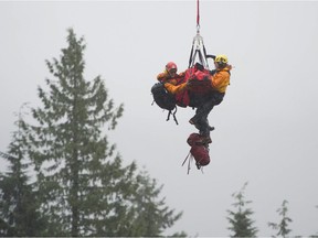 Dog walker Annette Poitras, who was lost with several dogs on The Westwood Plateau area of Coquitlam for several days, was located by SAR volunteers and police late morning Wednesday, Nov. 22, 2017. Poitras and the dogs were long-line rescued by helicopter and brought to safety.