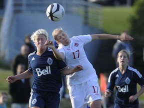 The former Whitecaps Women's team in a training match against the Canadian Olympic team in 2012.