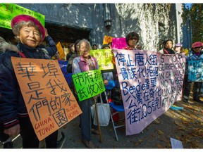 Chinatown residents rally in front of Vancouver city hall during 2017 rezoning process involving a Keefer Street property where the city's citizen engagement process was criticized.