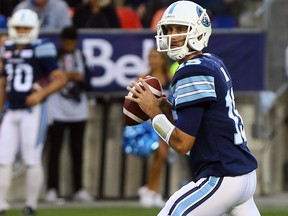 Quarterback Ricky Ray of the Toronto Argonauts looks for a pass against the Ottawa Redblacks during CFL action at BMO Field in Toronto on July 24, 2017. Dave Abel/Toronto Sun/Postmedia Network)