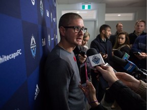 Vancouver Whitecaps head coach Carl Robinson listens to a question during a news conference after the MLS soccer team was eliminated from the playoffs last week.