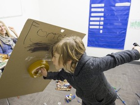 RICHMOND. November 30 2017. Lara DePauli watches her son Forrest DePauli play in his own room at the Glen Eden School, Richmond, November 30 2017. Gerry Kahrmann / PNG staff photo) ( Prov / Sun News ) 00051547A Story by Lori Culbert [PNG Merlin Archive] Gerry Kahrmann