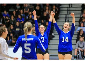 Members of the Belmont Bulldogs Quad A volleyball team celebrate after winning the Big Kahuna provincial champions last Saturday at the Langley Events Centre by defeating North Vancouver's Handsworth Royals in straight sets (25-12, 25-16, 25-16) in the finale.