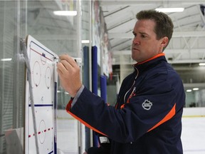 FILE PHOTO - Assistant Coach Dean Chynoweth of the New York Islanders takes part in prospects camp on July 10, 2009 at Iceworks in Syosset, New York. Chynoweth is now an associate coach with the Vancouver Giants.