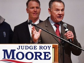 U.S. Senate candidate Roy Moore speaks at the end of an election-night watch party at the RSA activity center, Tuesday, Dec. 12, 2017, in Montgomery, Ala. Moore refused to concede and raised the possibility of a recount during a brief appearance at a somber campaign party in Montgomery. "It's not over," Moore said. He added, "We know that God is still in control."