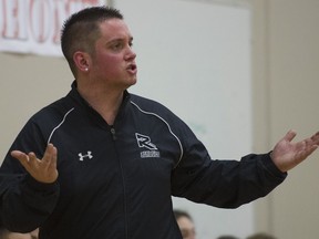 FILE PHOTO - Burnaby South Rebels coach Mike Bell gestures as he watches his team play Harry Ainlay Titans in a semi final basketball game at the 26th Annual Legal Beagle Invitational  at Terry Fox Secondary school Port Coquitlam, January 09 2015.