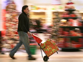 According to new survey results, holiday spending among Canadians has gone down, while the number of online shoppers has gone up.
