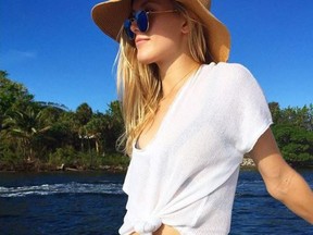 Tennis ace Eugenie Bouchard had a beach date with her Twitter paramour John Goehrke.