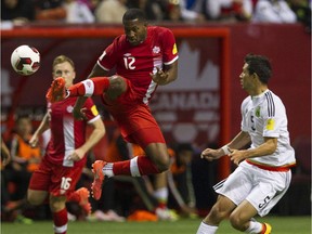 Canada's Doneil Henryin a match against Mexico in a FIFA World Cup soccer qualifier at B.C. Place Stadium on March 25, 2016.