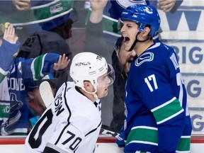 Nic Dowd celebrates after giving the Canucks a brief 3-2 lead Saturday.