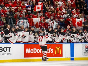 Canada's Robert Thomas celebrates his goal with the bench during first period IIHF World Junior Championship preliminary action against Denmark, in Buffalo, N.Y., Saturday, December 30, 2017.