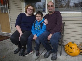 Josh Potma, nine, with his parents Sue and Kevin Potma, at their Mission, B.C. home.