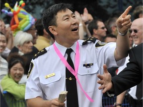 Then-Vancouver Police Chief Jim Chu takes part in the 2010 Pride Parade while in uniform.